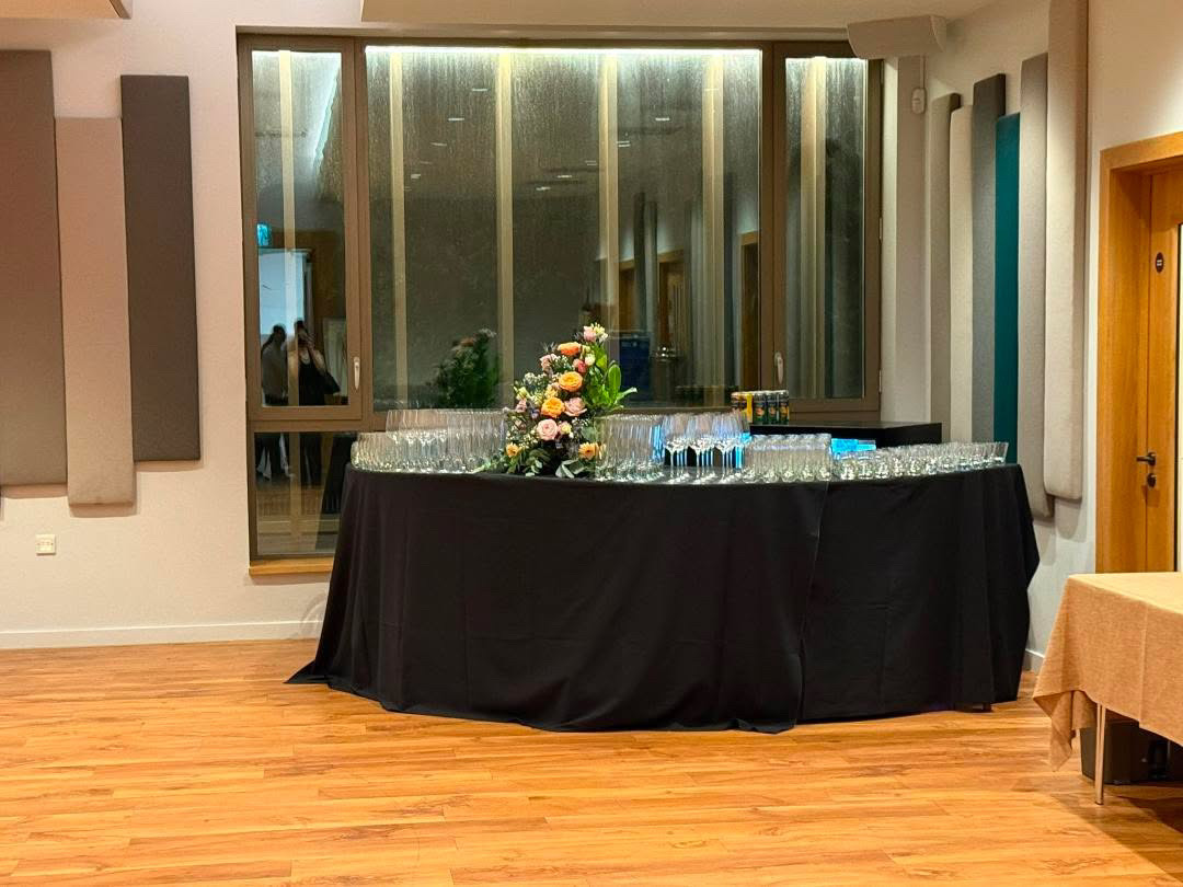 Event bar prepared with bottles and glassware