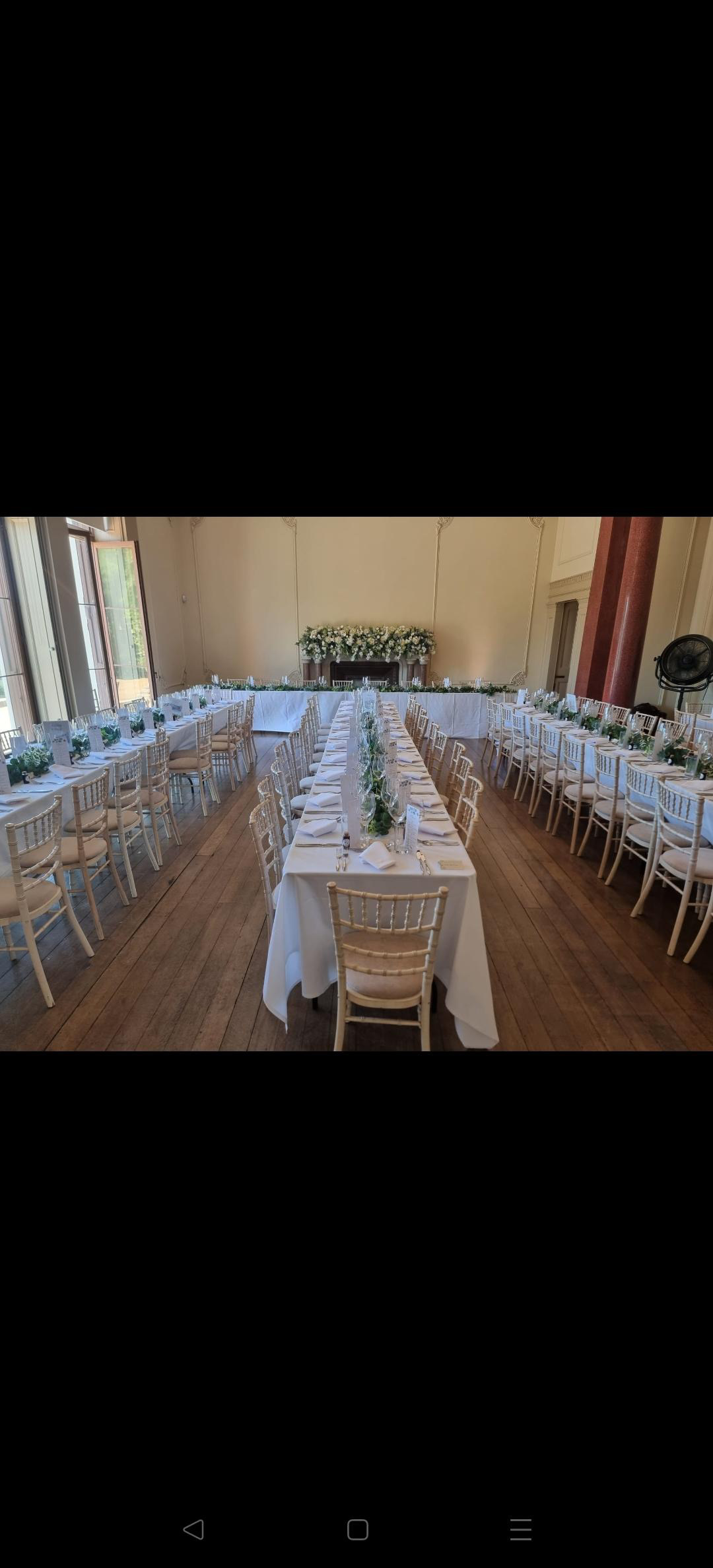 Long table prepared in an elegant dining room